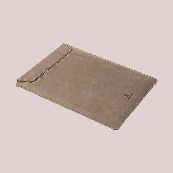 Protect your Macbook with a grey leather sleeve